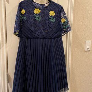 Knee length maternity dress with sheer shoulders